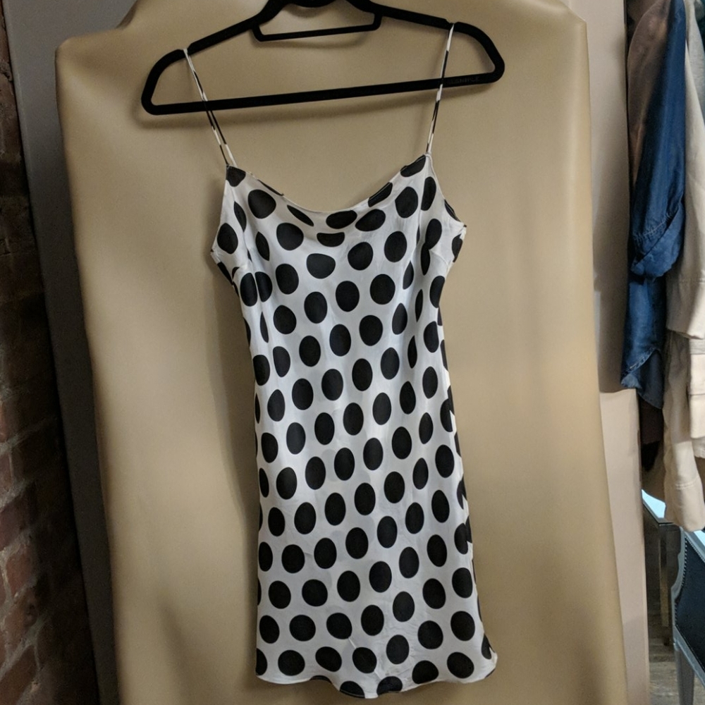 Milly white with black polkadot silk top.